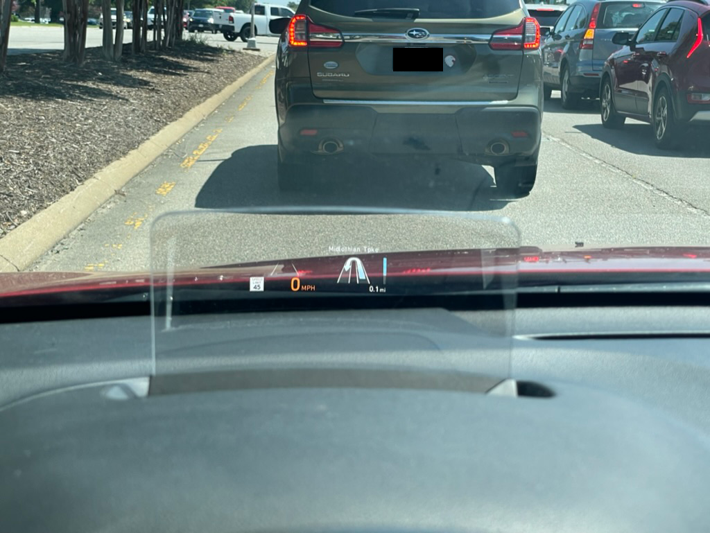 A photo of the Kia Niro EV heads-up display, showing the speed limit, speed, lane keep assist and GPS navigation.